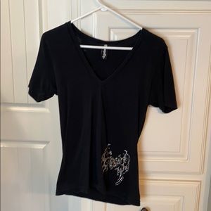 Black v neck T-shirt with heart and wings design